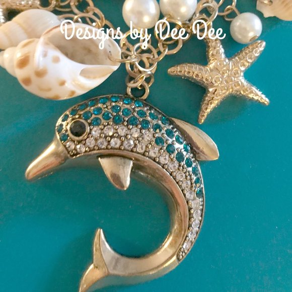 Designs by Dee Dee Jewelry - Dolphin and Sea Shell Necklace